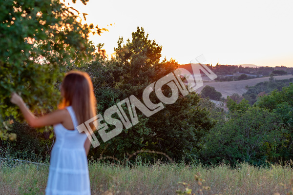 Young Girl in white and the Magic Tree