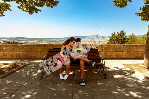 Girl and Boy on a bench