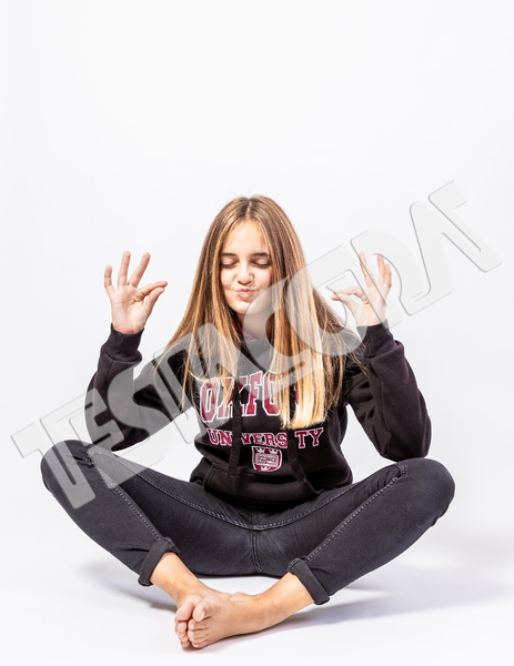 Young Girl in funny oriental pose