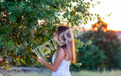 Young Girl in white at sunset