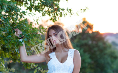 Young Girl posing near the magic tree