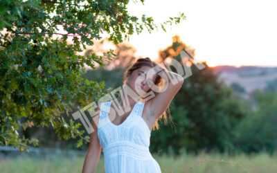 Young Girl posing near the magic tree